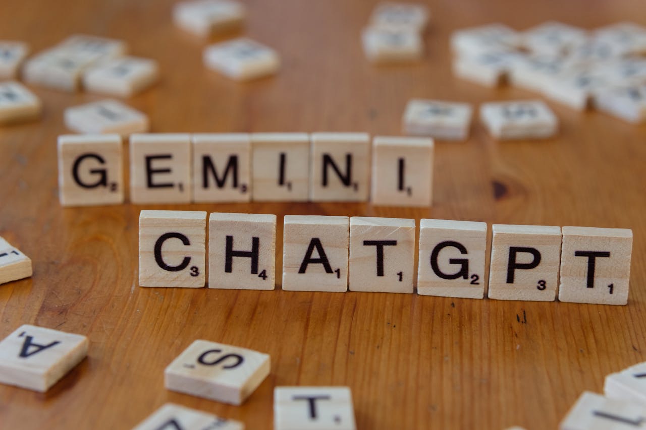 gemini and chatgpt written on square shaped wooden blocks